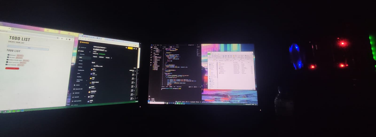 Coding desk setup with multiple monitors
